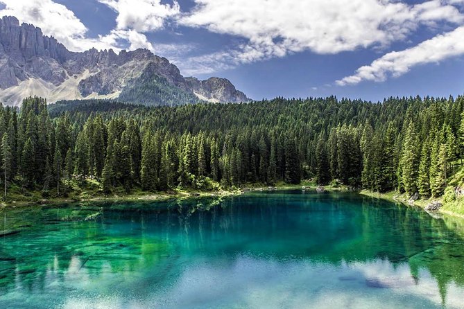 4-Day Scenic Dolomites Tour from Milan - Day 3: Lake Carezza, Merano, Canazei, and Marmolada