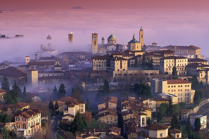 Bergamo Top Sights Private and Personalized Guided Walking Tour - Walking the medieval streets to Rocca di Bergamo