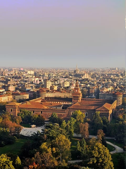 Branca Tower and Sforza Castle Guided Tour - Starting beneath the flags at Triennale Milano
