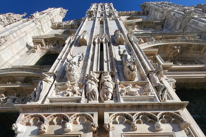 Cathedral & Skyline: Duomo di Milano Tour with Rooftop Access - The rooftop terraces offer Milan’s most memorable view