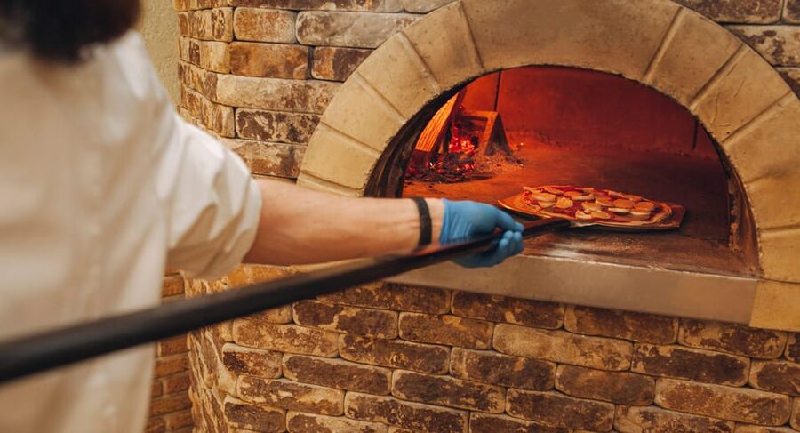 Como: Premium Pizza-Making Class at a Pizzeria - The wood-fired oven moment