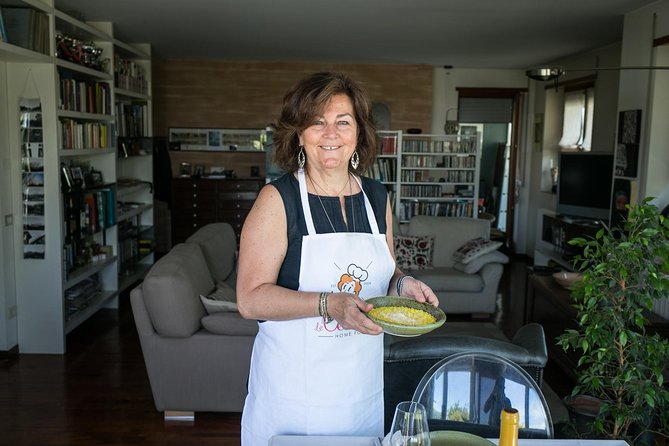 Dine & Enjoy a Cooking Demo at Local's Home in Lake Maggiore - A home table in Baveno, not a standard restaurant