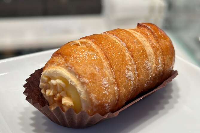 Eating Milan Street Food Tour with Guided Tasting and Sightseeing - Piazza degli Affari brings in modern Milan