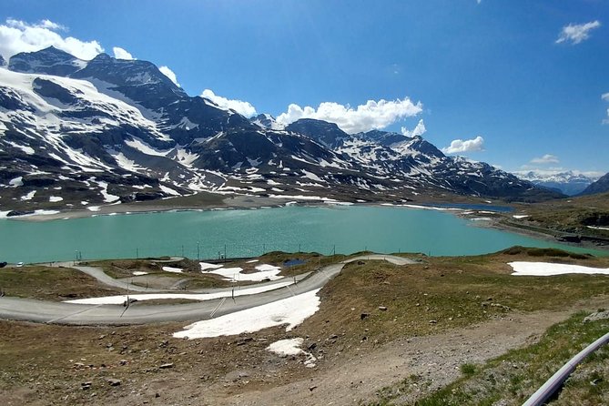 From Lake Como or Milan: Bernina Red Train Tour - Lake St. Moritz gives you a short walk beside the water