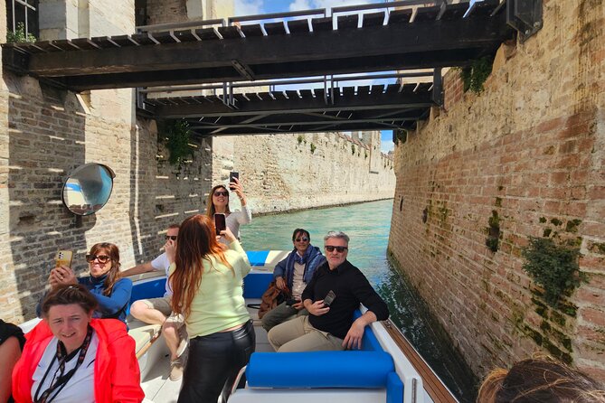 From Milan: Verona, Sirmione and Lake Garda Tour with Boat Cruise - The private boat cruise across Lake Garda