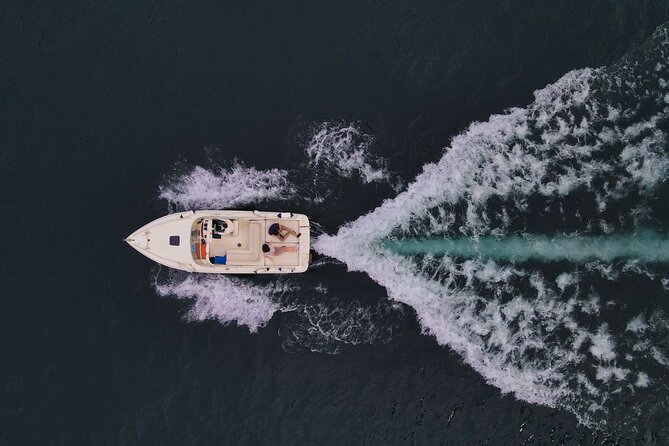 half day private boat tour on Lake Como - Moltrasio and the Versace connection