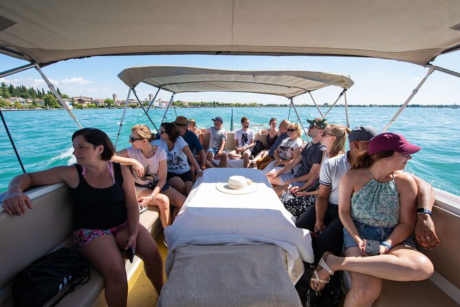 Lake Garda Afternoon Sightseeing Cruise from Sirmione - Leaving Sirmione and seeing the peninsula from the water