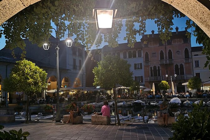 Lake Garda at Sunset: Desenzano Walk & Boat around Sirmione - Boarding the boat from Desenzano