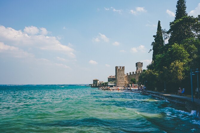Lake Garda: Sirmione Boat Tour and Walking Tour - Reaching the Grotte di Catullo