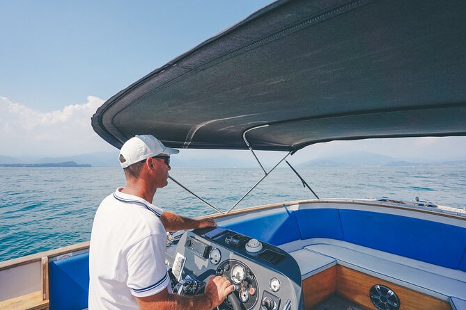 Lake Garda: Sirmione Boat Tour and Walking Tour - Walking through the medieval center
