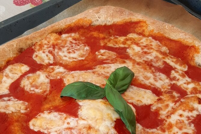 Mamma Mia! Authentic Italian Pizza Making Class - Topping your pizza and waiting for the oven