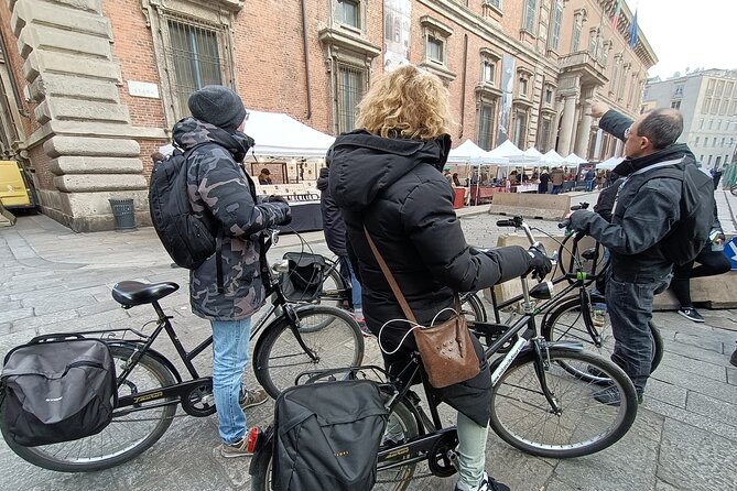 Milan: Bicycle Tour Live Tourist Guide 3 hours and half - Piazza Affari shows Milan’s modern side