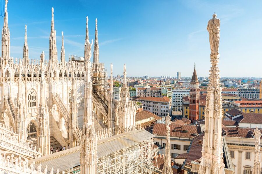 Milan Cathedral: Skip-the-Line Private Tour with Rooftop - Inside the cathedral: marble, glass, and Saint Bartholomew