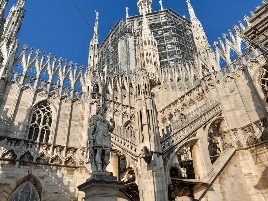 Milan: Duomo Cathedral and its Terraces guided Tour - Inside the cathedral, where the scale changes