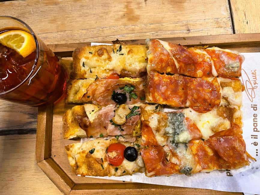 Milan: Food Tour with Pasta, Pizza, Cannoli, and Tiramisu! - Stop two: a bakery break with pizza