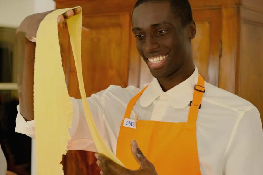Milan: Fresh Pasta and Tiramisù Class in A Historical Home - Cooking pasta in an art-filled Milan home