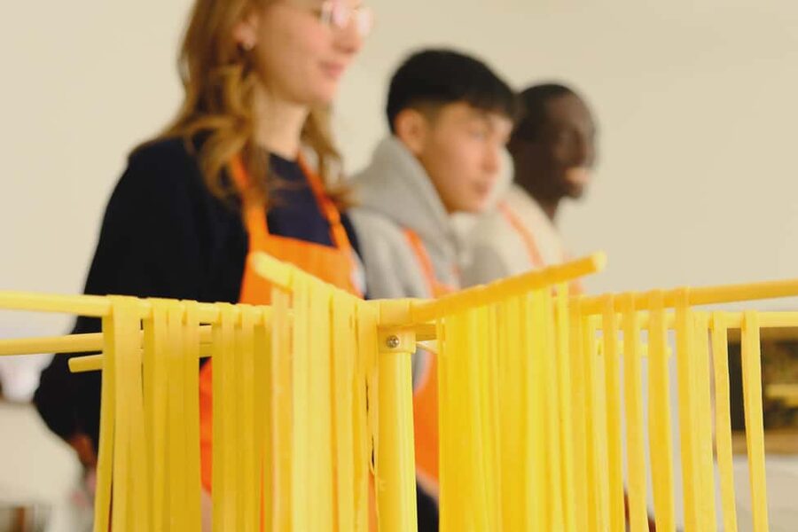 Milan: Fresh Pasta and Tiramisù Class in A Historical Home - Sitting down to eat what you made