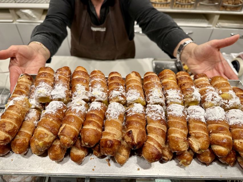 Milan: Guided Street Food Walking Tour with Food Tasting - Piazza Affari, The Finger, and Milan’s unusual public art