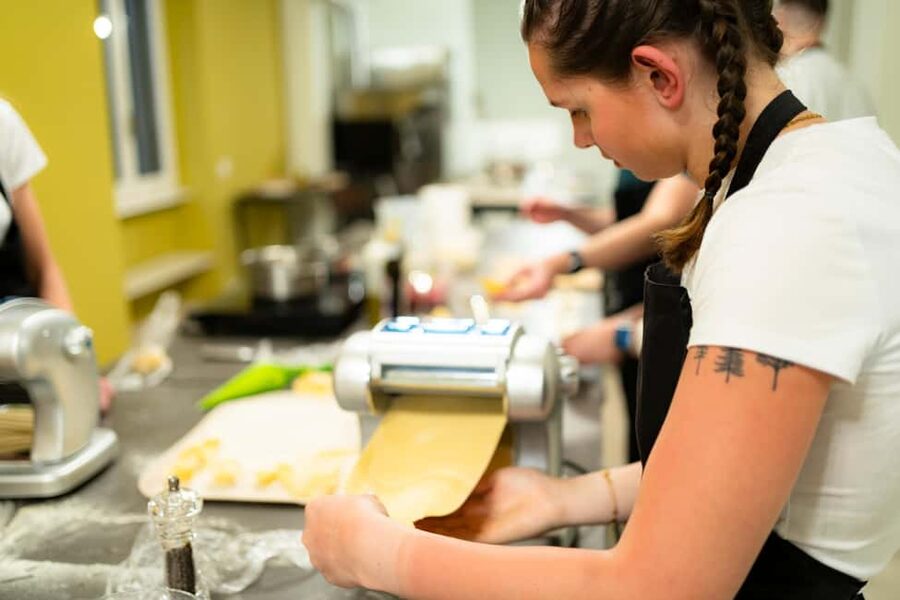 Milan: Pasta, Gnocchi and Tiramisù Cooking Class with Wine - Rolling pasta and shaping ravioli