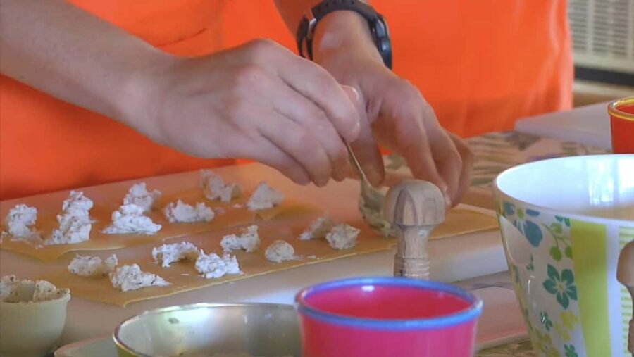 Milan: Pasta, Ravioli, and Gelato Class in a Glamorous Home - Folding ravioli with a special filling