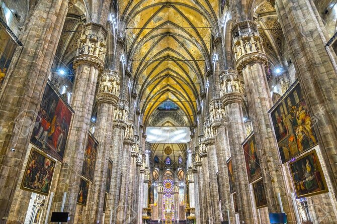 Milan Small Group: Duomo & Rooftop, Sforza Castle, Gelato Tasting - Inside the cathedral and below Piazza Duomo