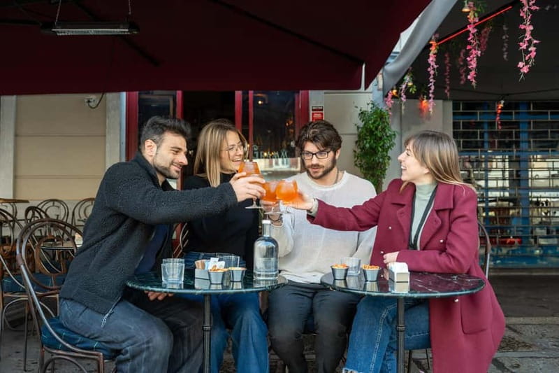 Milan: Sunset Navigli Food & Drinks Tour with a Local - Stop two: Italian wine, cheeses, and small bites