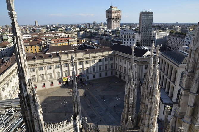 Milan Super Saver: Skip-the-line Duomo and Rooftop Tour - Stairs, marble, and changing weather