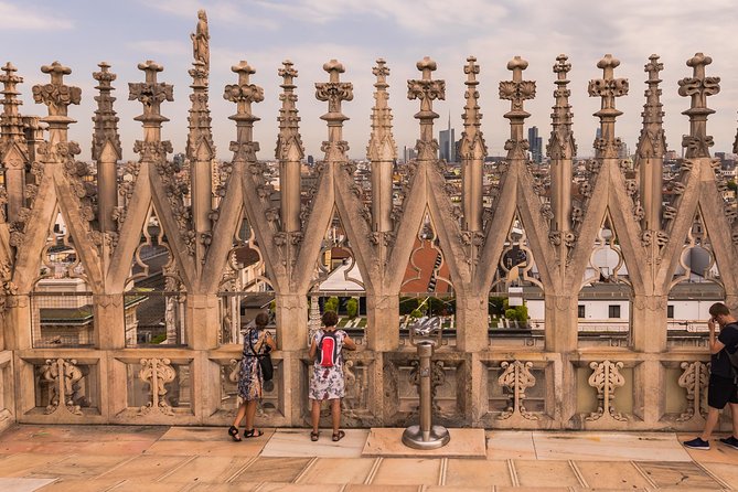 Milan Super Saver: Skip-the-line Duomo and Rooftop Tour - Inside the Duomo, where the details get a voice