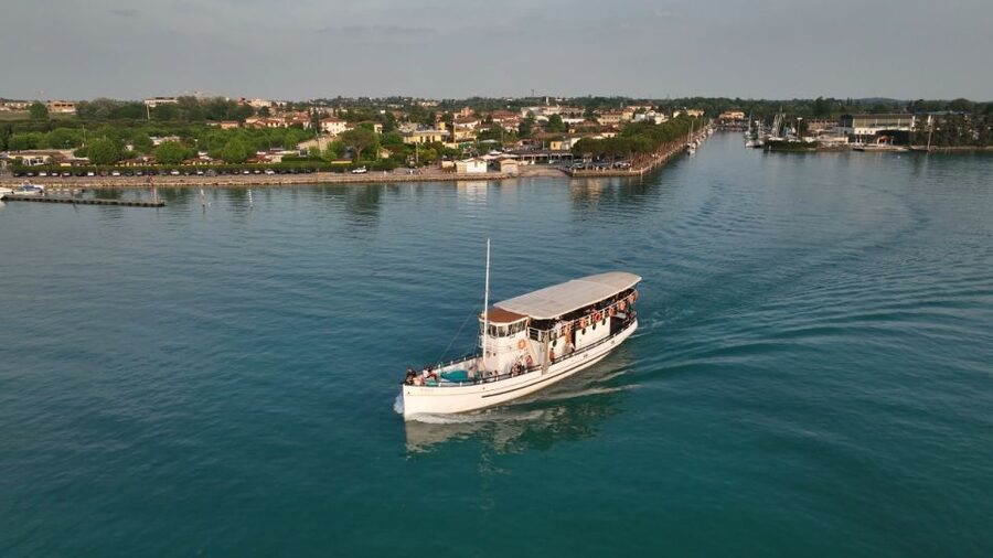 Peschiera: Afternoon Boat Trip to Sirmione with Swim Stop - Cruising the southern shore toward Sirmione