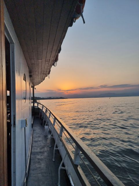 Peschiera: Afternoon Boat Trip to Sirmione with Swim Stop - A drink, a deck, and the ride home