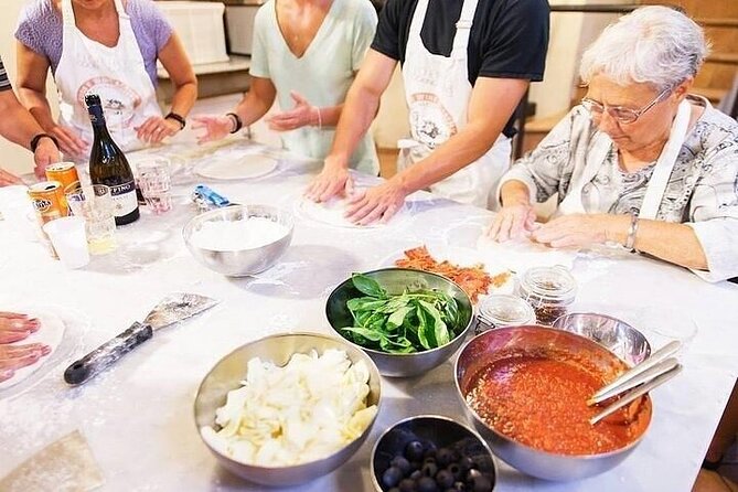 Pizza and Gelato Cooking Class in Milan Small Group Only - Wine, olive oil, and the meal at the end