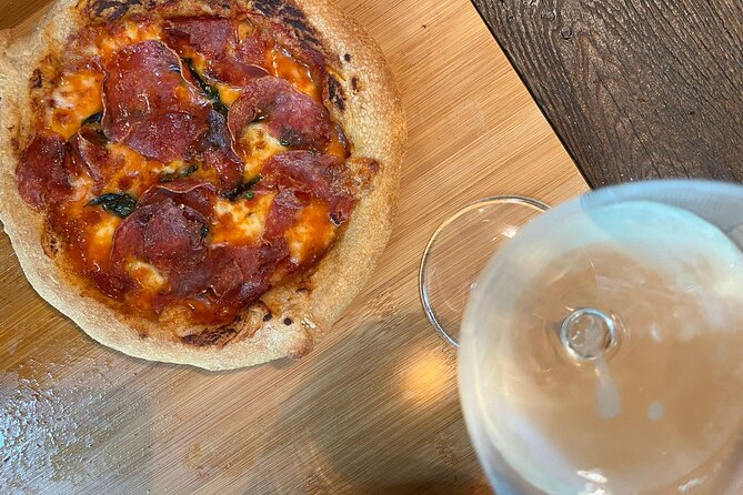 Pizza Cooking Class with Tiramisù and Wine Tasting in Milan - Making pizza in central Milan