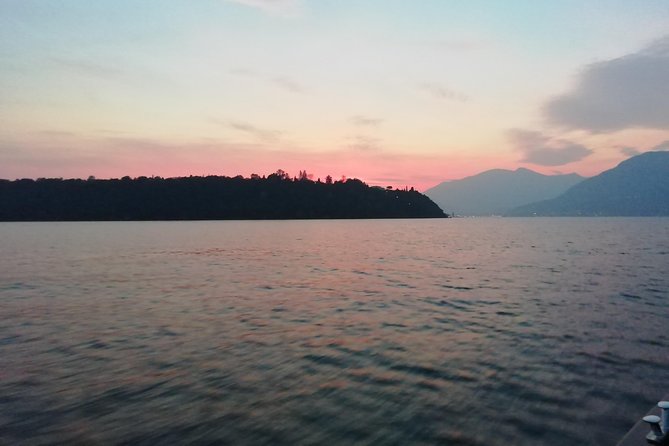 Private sunset cruise with toast - Slowly circling Isola del Garda