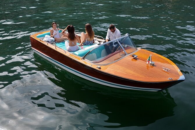 Private tour in classic wooden boat - The villas are better from the water