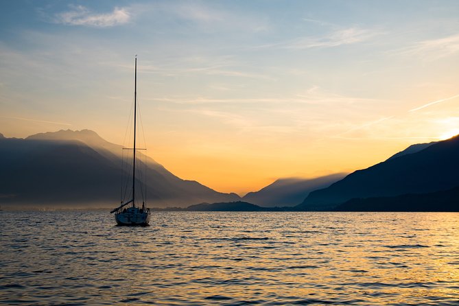 Sailing at Sunset on Lake Como: How to escape from daily routine - Lecco and the lakeside promenade from the water