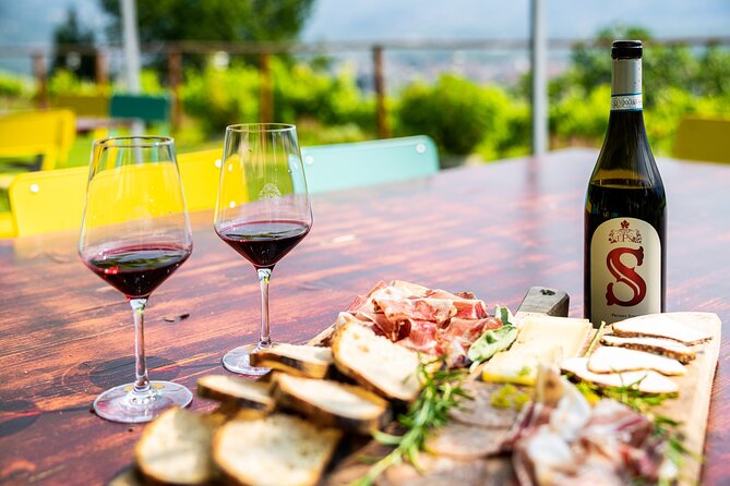 Savor Ossola Wines & Local Treats in a Scenic Vineyard - Three Ossola wines with food from nearby farms