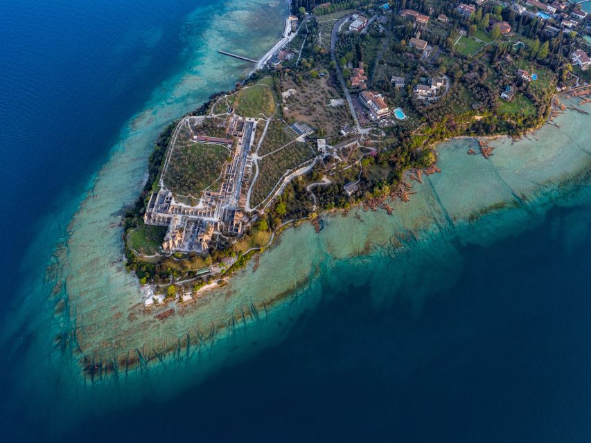 Sirmione: 25 Minute Boat Cruise around the Peninsula - The bubbling sulfur spring near the peninsula