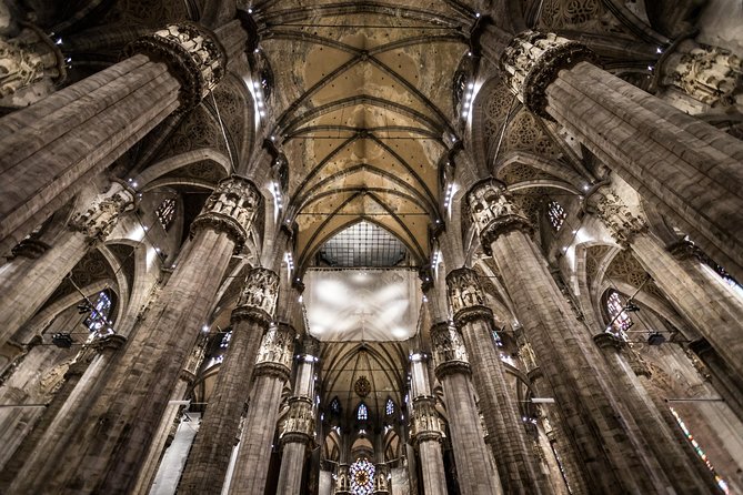 Skip the Line: Milan Duomo Tour - Inside the cathedral: stained glass, statues, and the altar