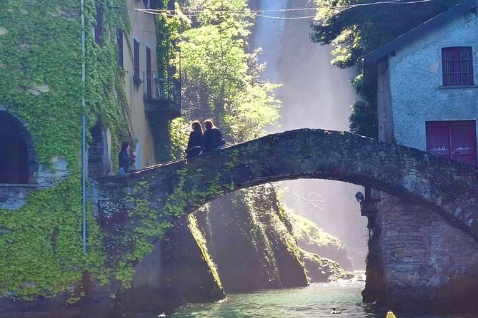 Tour aboard the iconic Bertram 31 Sedan on Lake Como - Villa Pliniana, an old lakeside setting near Torno